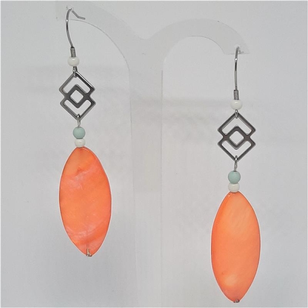 Boucles en coquillage oval orange